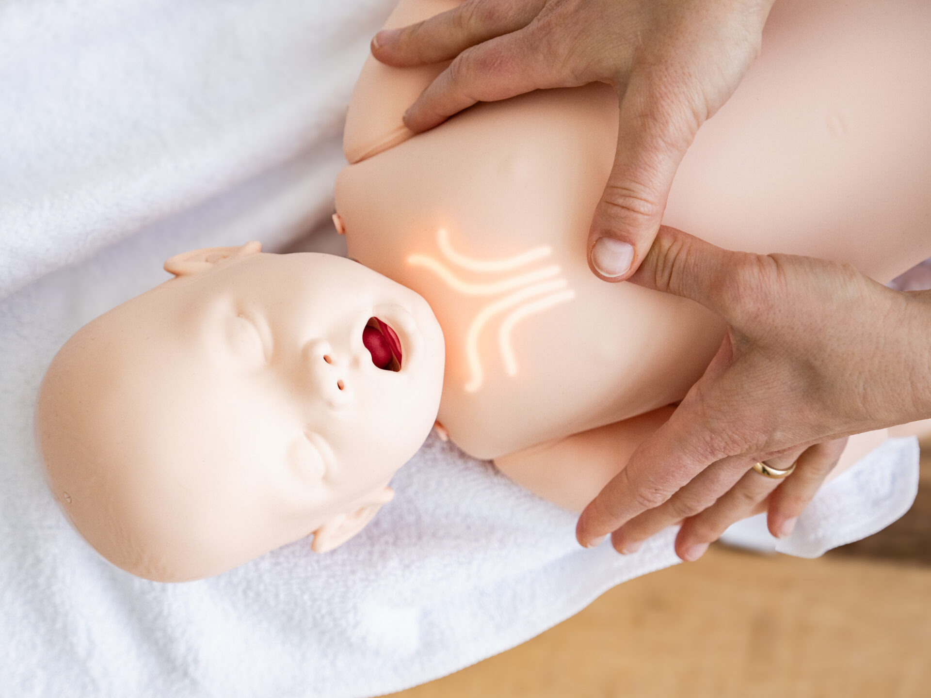 Reanimation an einer Puppe üben